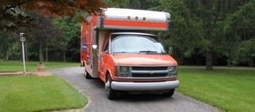 Water Damage White Marsh Box Truck Driving To Residential Job Site